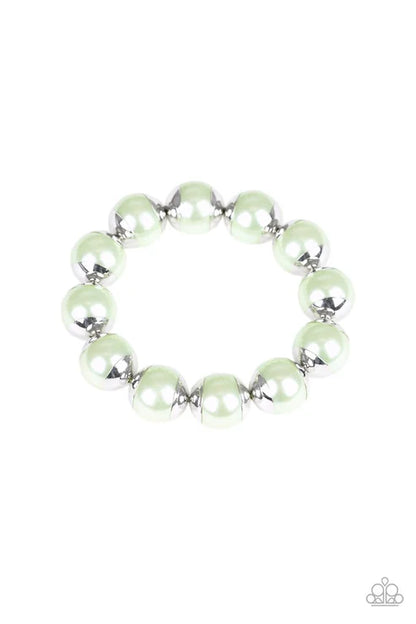 Green beaded bracelet on a white background