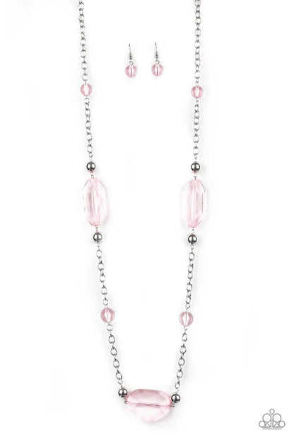 Necklace and earrings set with pink beads on a white background