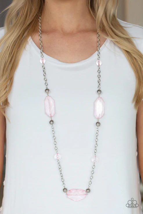 Long necklace with pink beads and silver chain on a white background