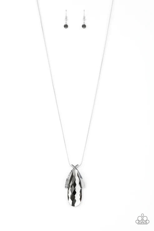 Silver feather pendant necklace and matching earrings on a white background