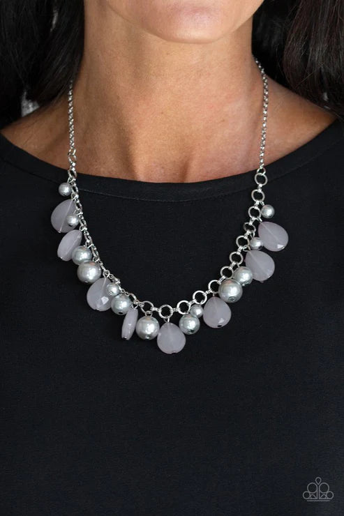 Necklace with gray and silver beads on a black background