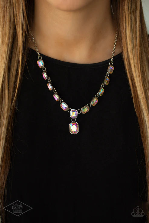 Necklace with iridescent beads on a black background