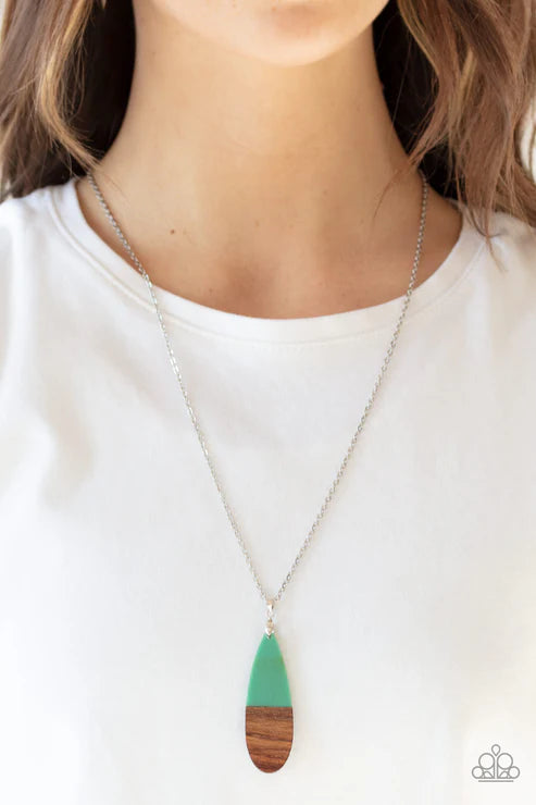 Necklace with a green and brown pendant on a white background
