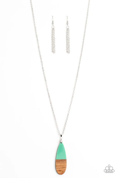 Necklace with a green and wood pendant on a white background
