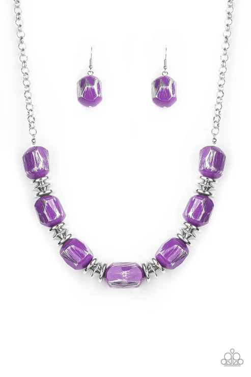Purple beaded necklace and earrings on a white background