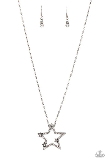 Star-shaped necklace with matching earrings on a white background