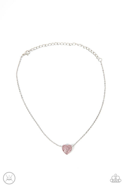 Necklace with a pink heart-shaped pendant on a white background