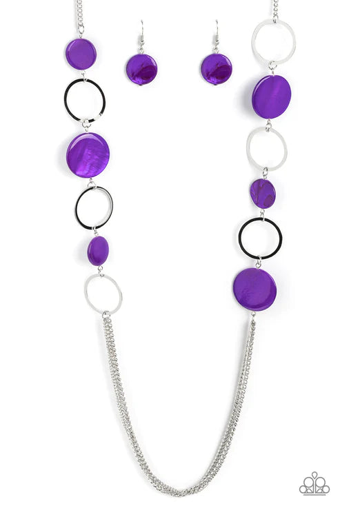 Purple beaded necklace and earrings on a white background
