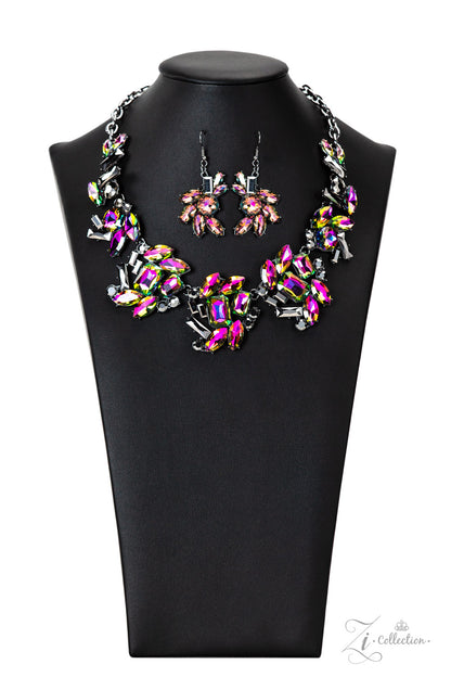 Jewelry set with necklace and earrings on a black mannequin bust