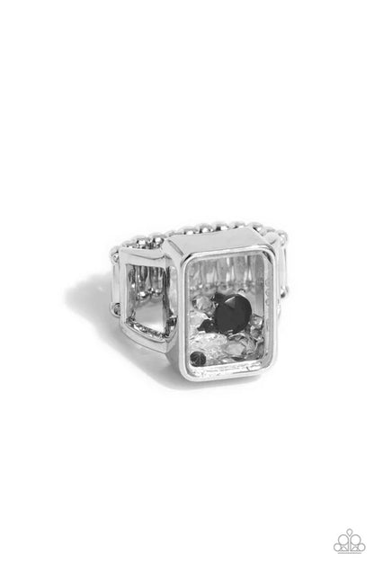 Silver ring with rectangular gemstones on a white background