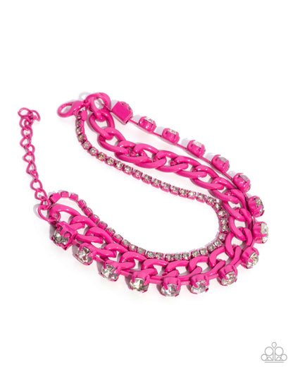 Pink chain necklace with rhinestones on a white background