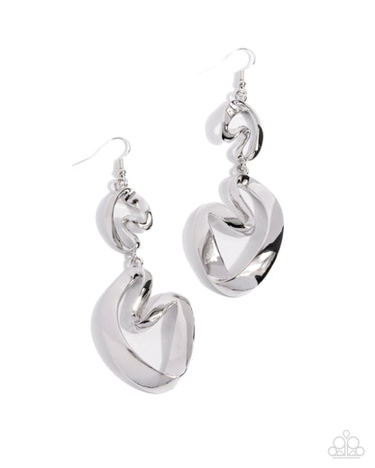 Pair of silver hoop earrings on a white background