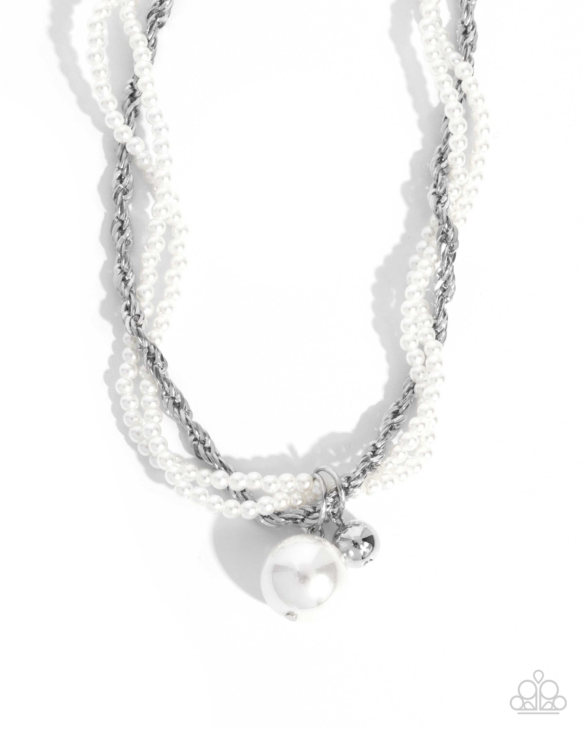 Necklace with pearls and silver accents on a white background