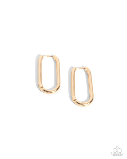 Gold hoop earrings on a white background