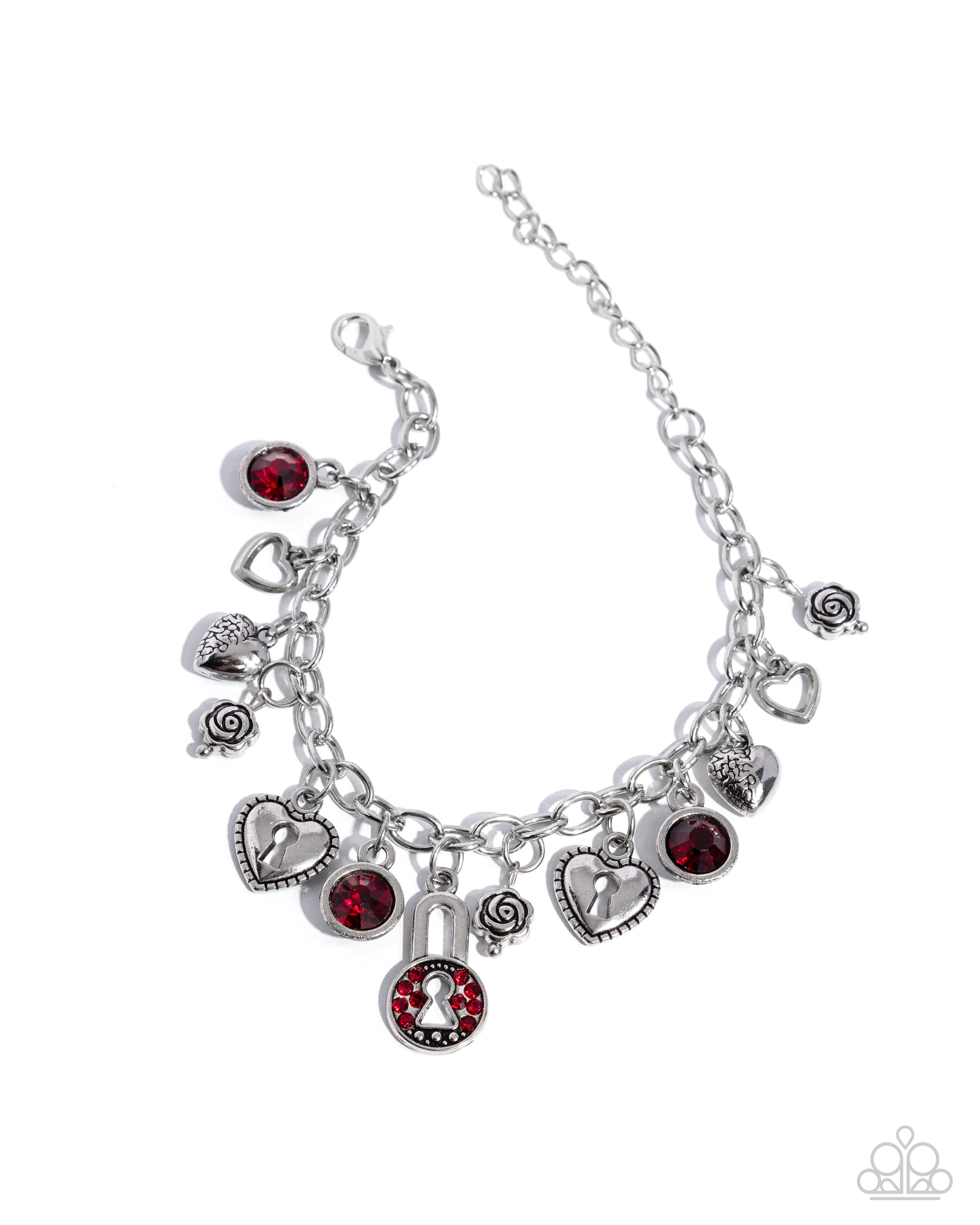 Silver bracelet with various charms on a white background