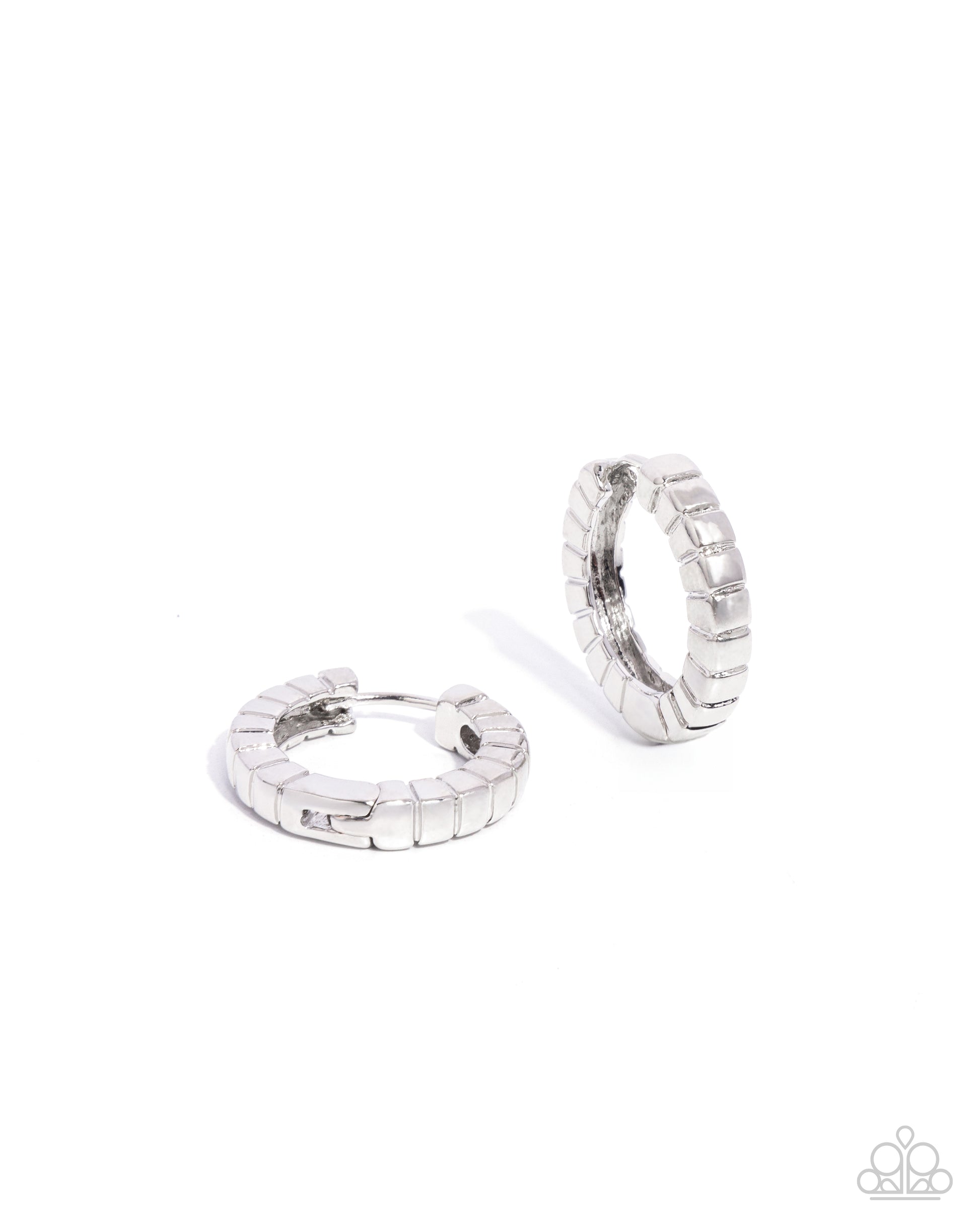 Pair of silver hoop earrings on a white background