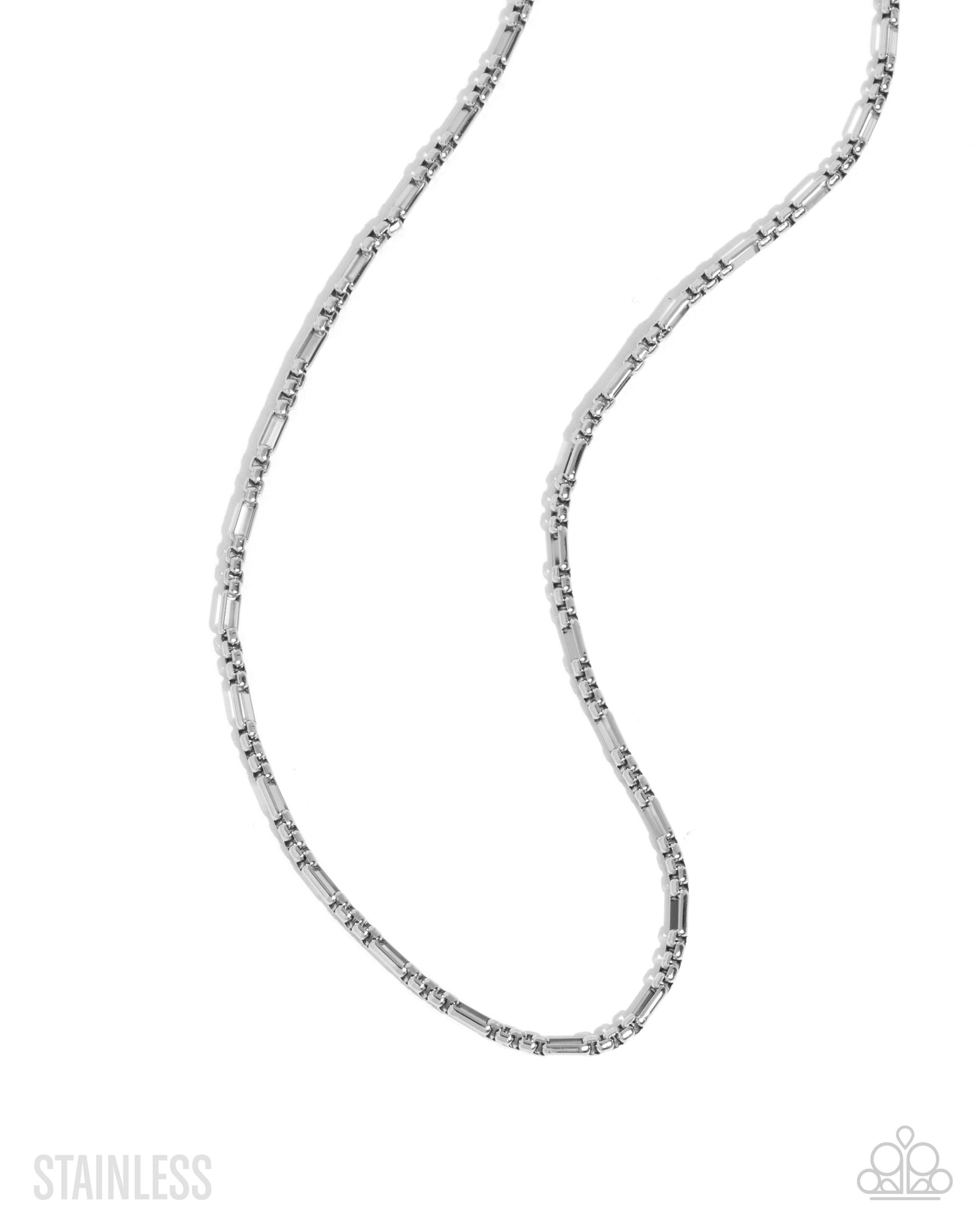 Silver chain necklace on a white background