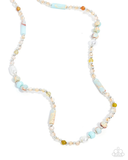 Necklace with multicolored beads on a white background