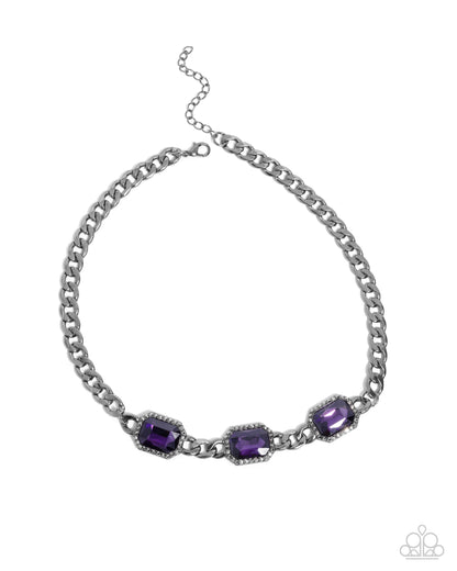 Silver chain necklace with purple gemstones on a white background