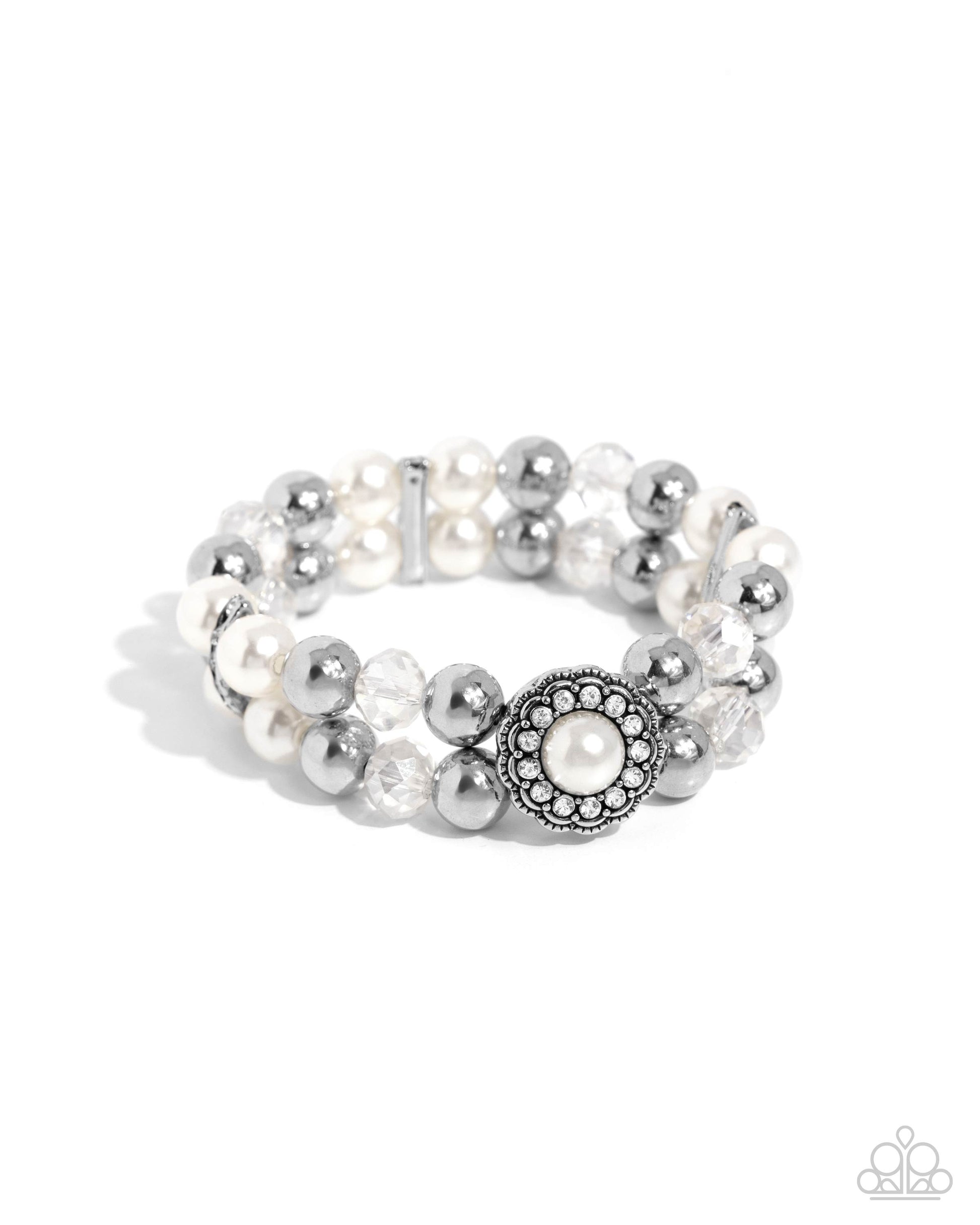 Silver and pearl beaded bracelet on a white background