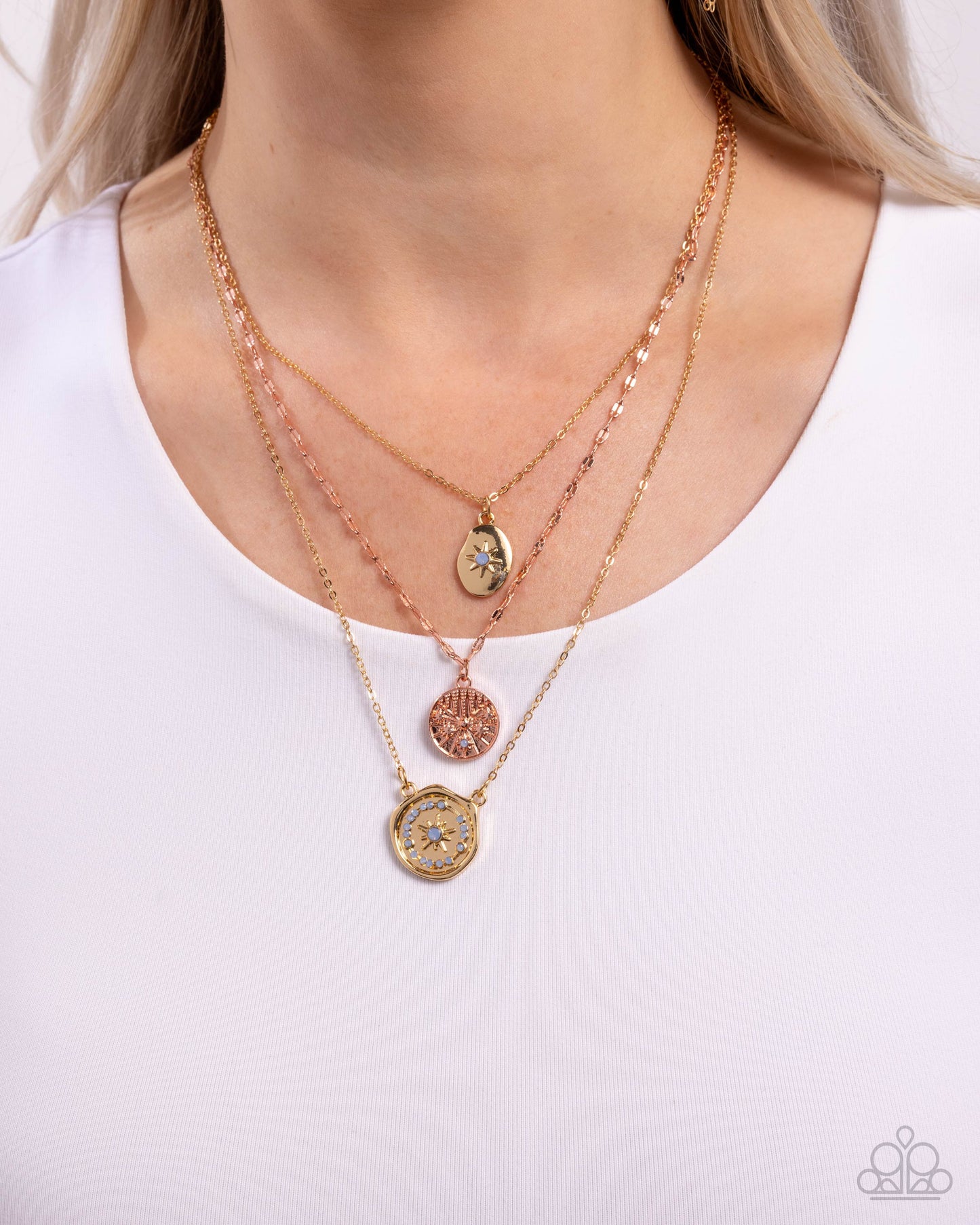 Necklace with circular pendants on a white background