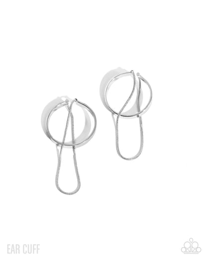 Silver ear cuff on a white background