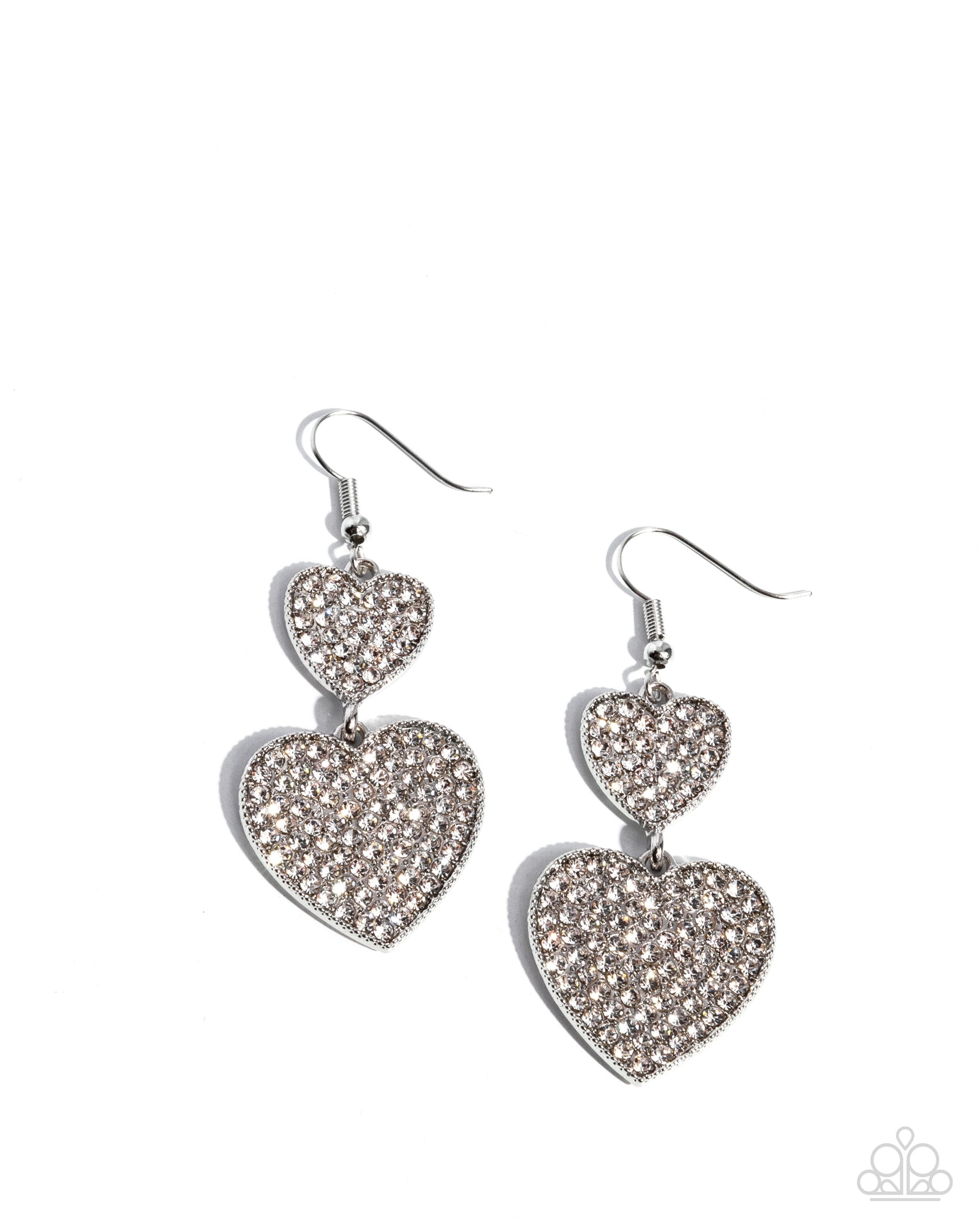 Heart-shaped earrings with rhinestone details on a white background