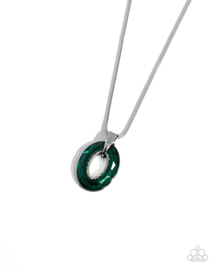 Necklace with a green pendant on a white background