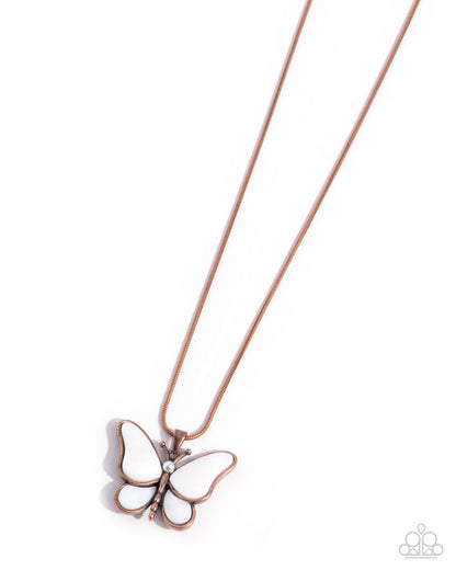 A rose gold butterfly pendant necklace with white enamel wings and a small clear rhinestone at the center, shown on a clean white background.