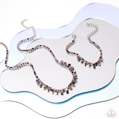 Necklace with multicolored beads on a white background