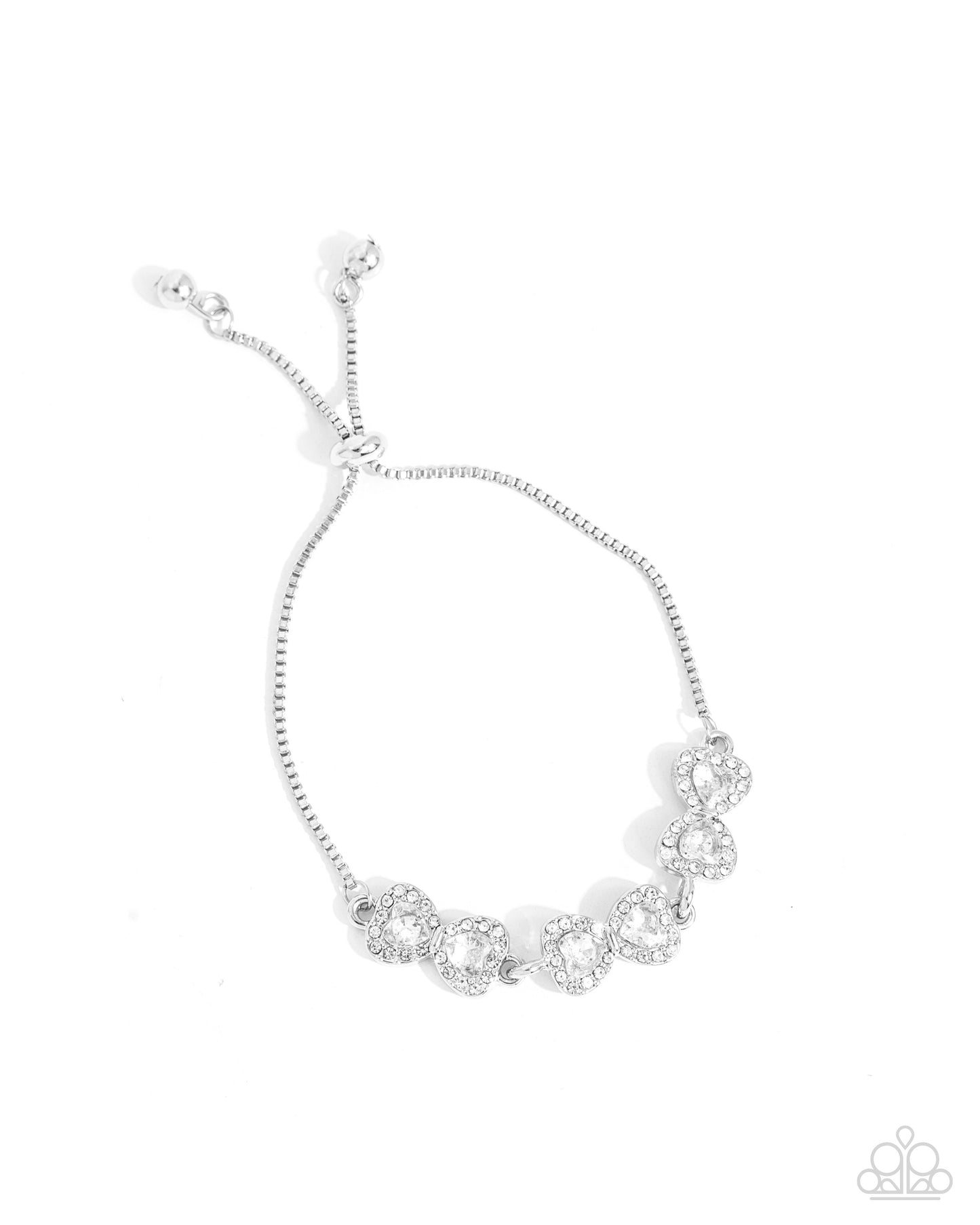 Silver bracelet with floral designs on a white background