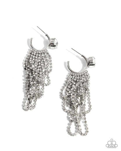 A pair of silver-tone huggie hoop earrings with cascading beaded fringe chains, shown on a plain white background.
