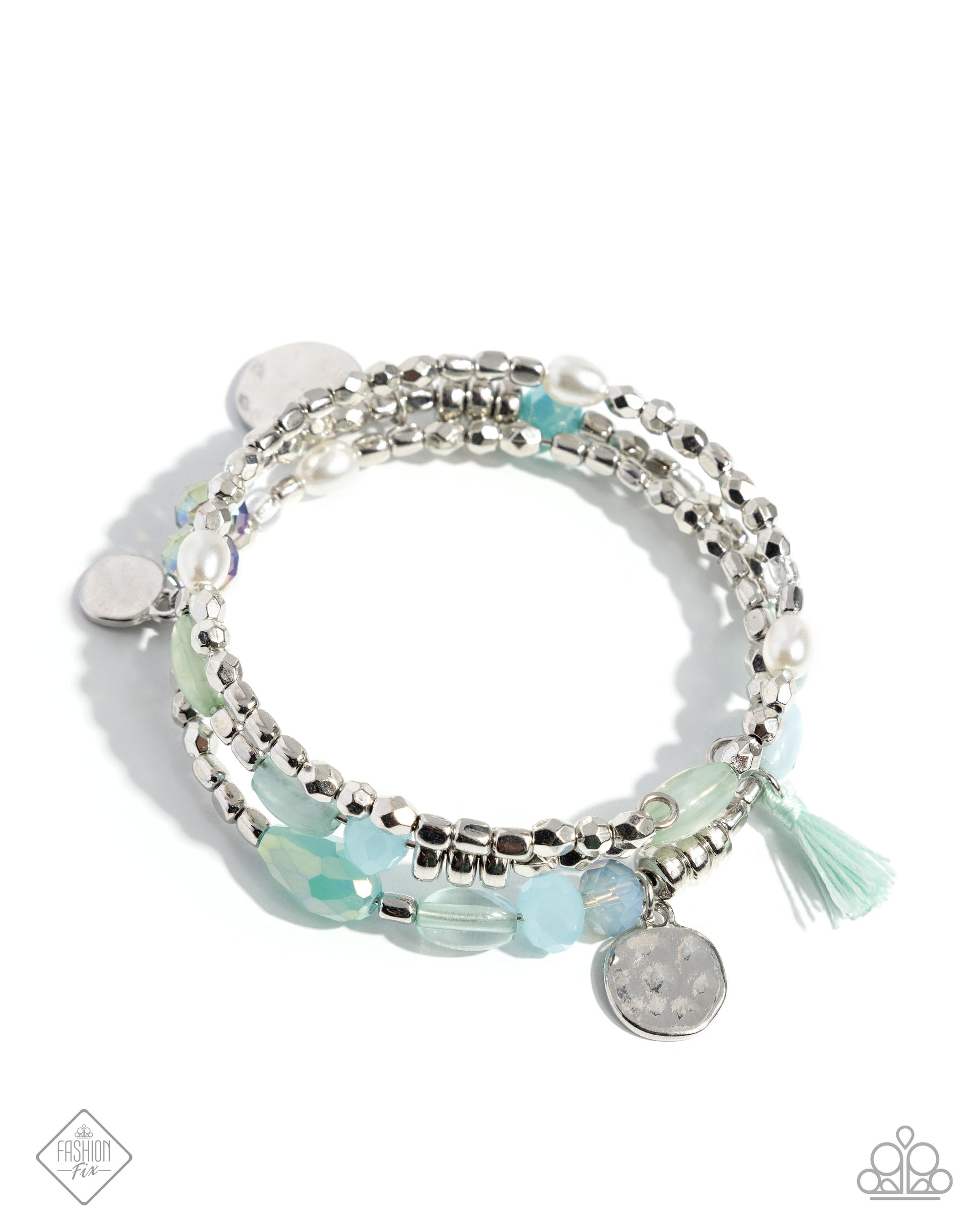 Stack of silver and light blue beaded bracelets on a white background