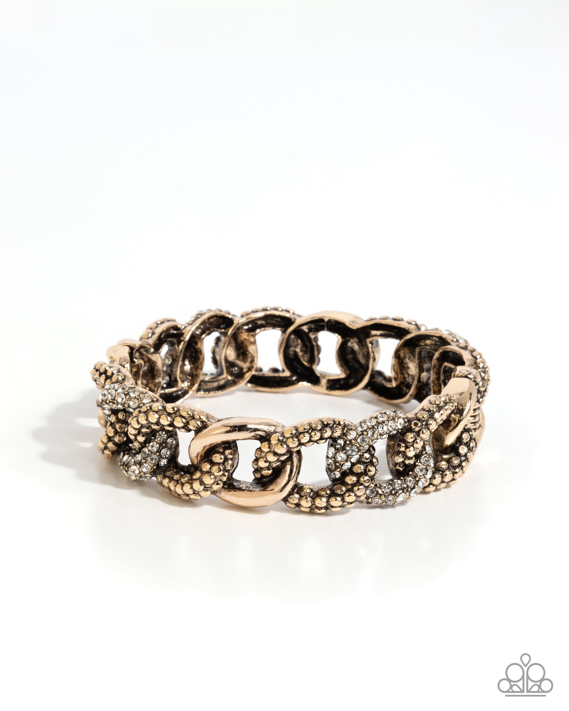 A  gold chain bracelet with textured pavé accents, photographed on a clean white background.