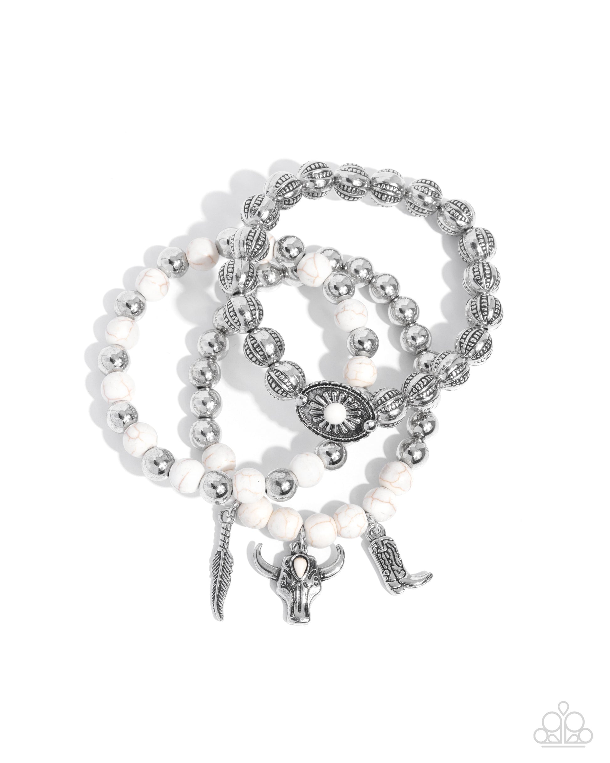 Set of pearl and silver beaded bracelets with charms on a white background