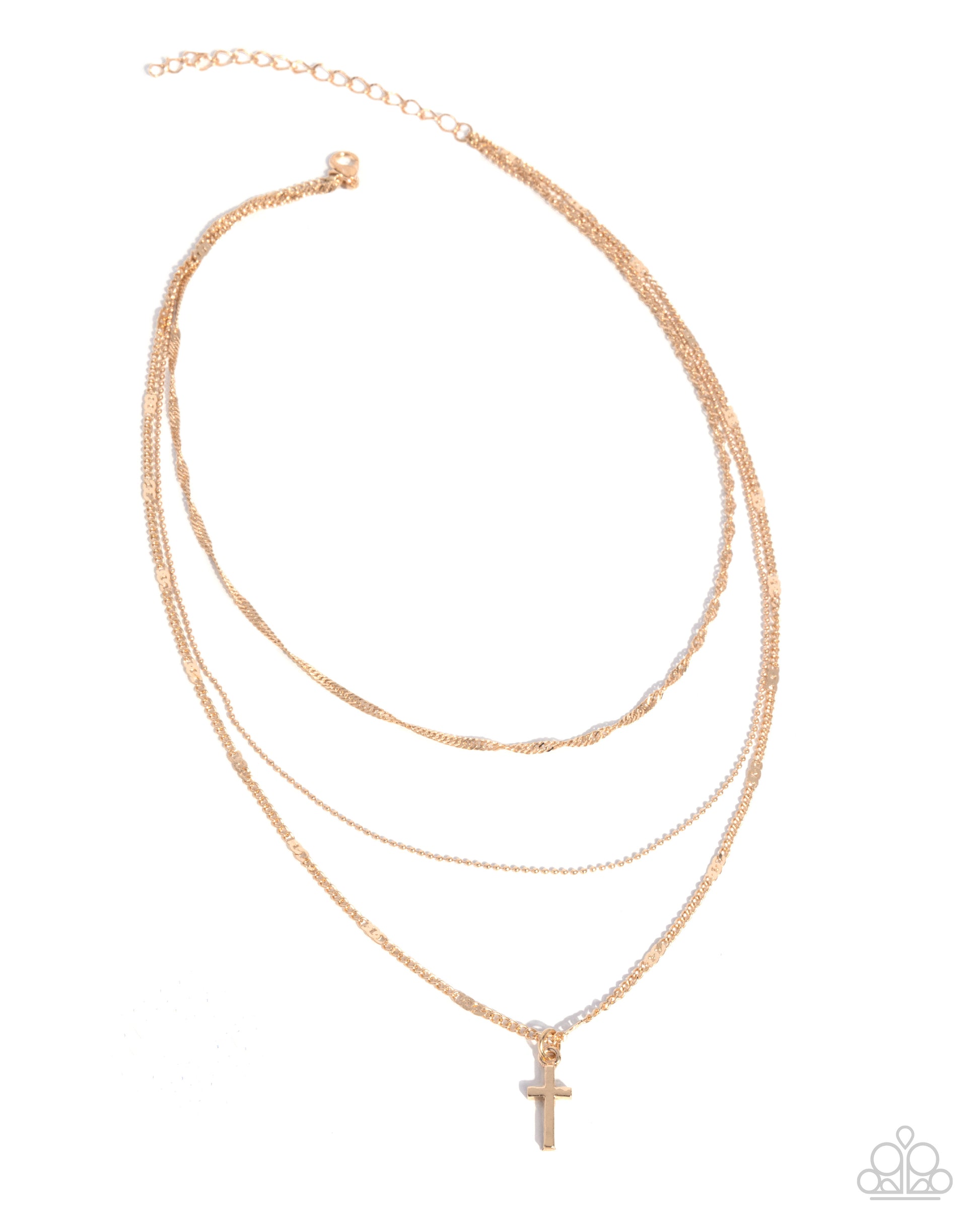 Stack of gold necklaces with a cross pendant on a white background