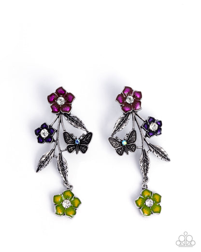 Pair of floral earrings with butterflies on a white background
