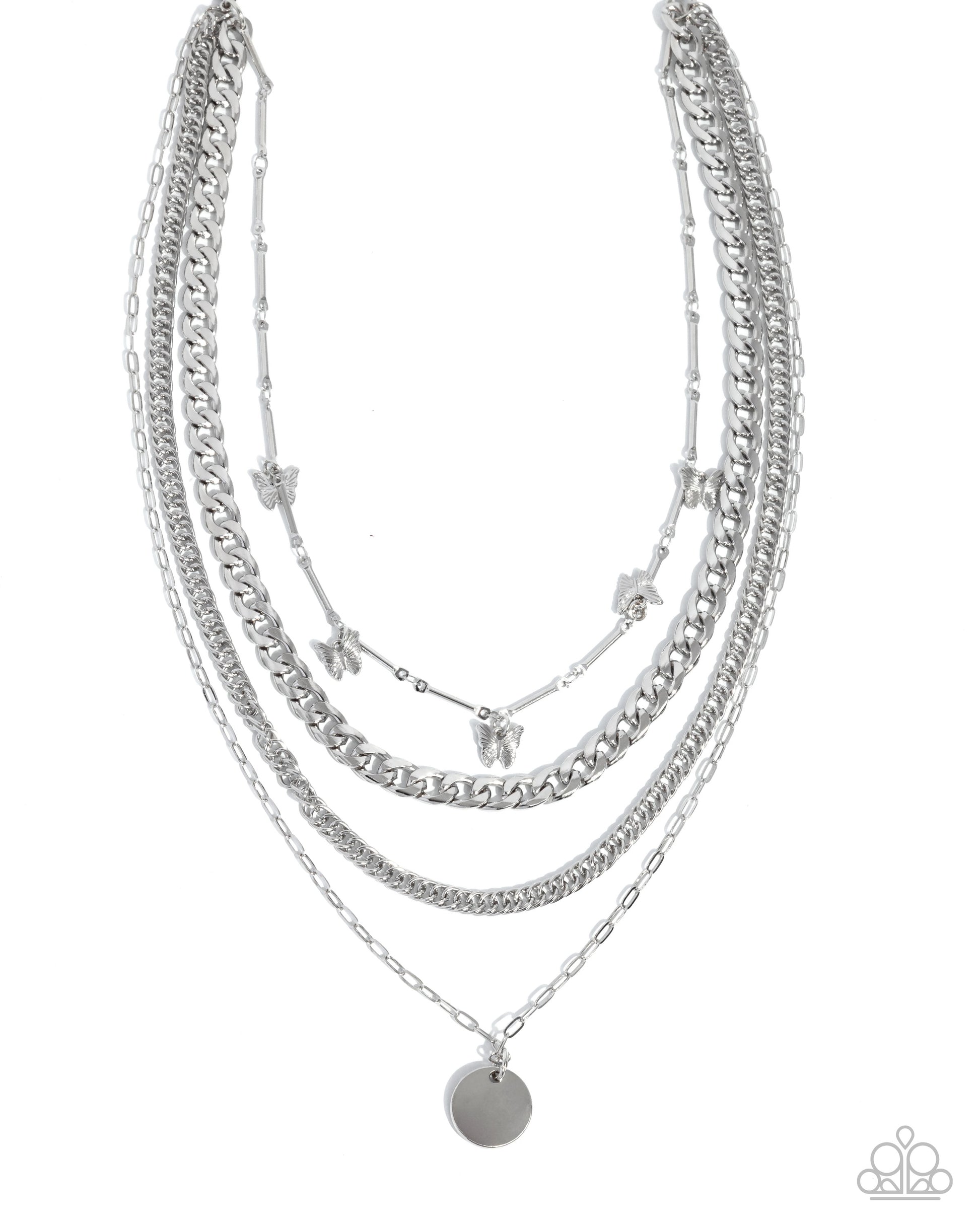 Stack of silver necklaces on a white background