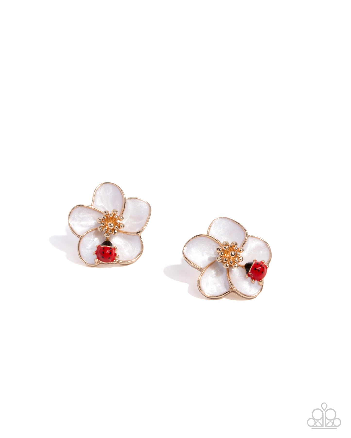 Pair of white flower earrings with red centers and gold accents on a white background