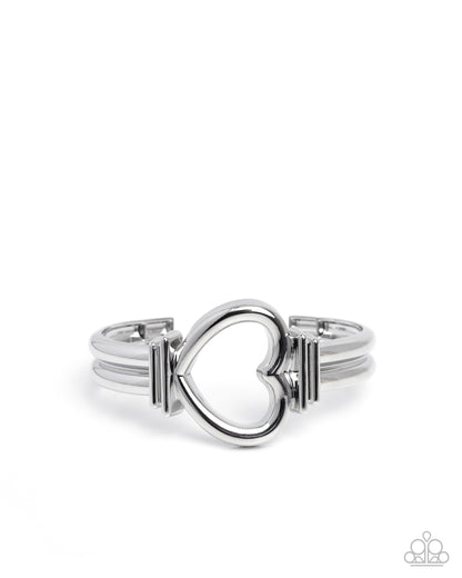 Silver heart-shaped bracelet on a white background