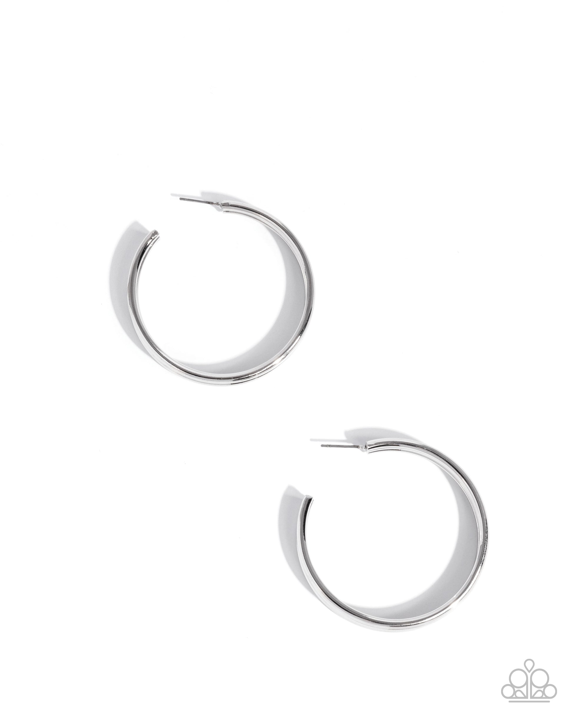 Pair of silver hoop earrings on a white background