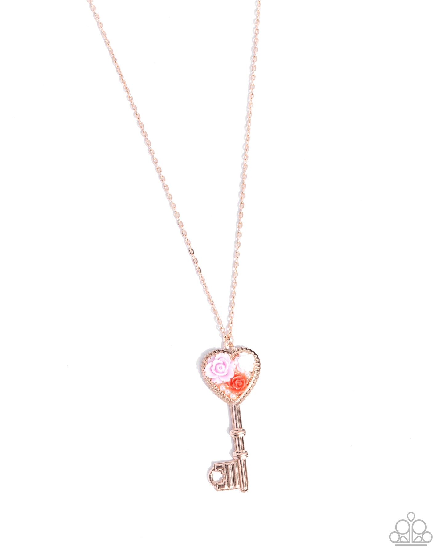 Rose gold key-shaped pendant necklace on a white background