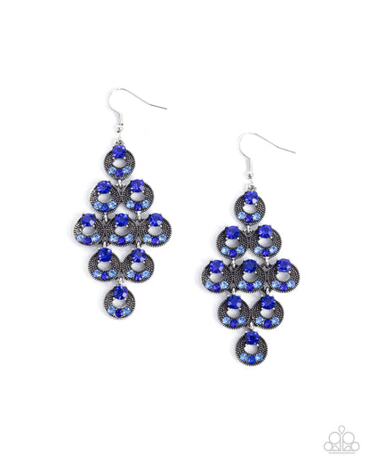 Pair of chandelier earrings with blue and silver design on a white background
