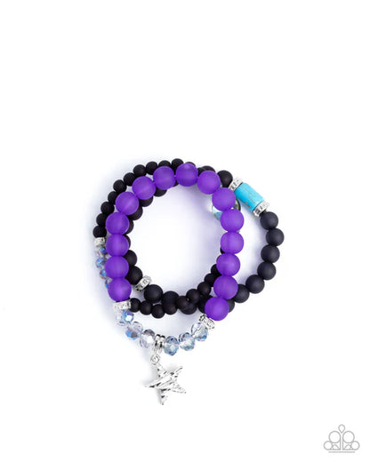 Two beaded bracelets with purple, black, and blue beads on a white background