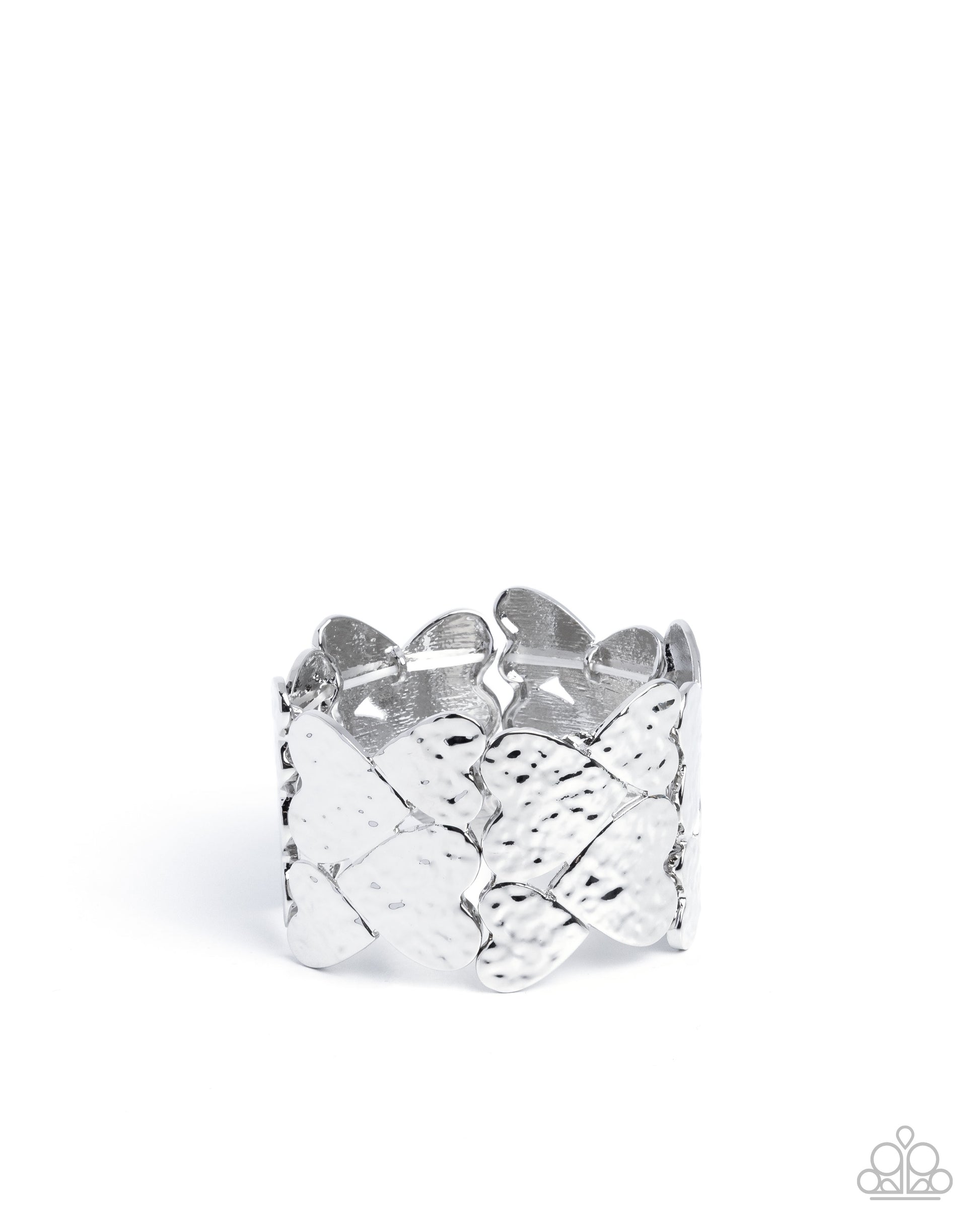 Silver ring with woven design on a white background