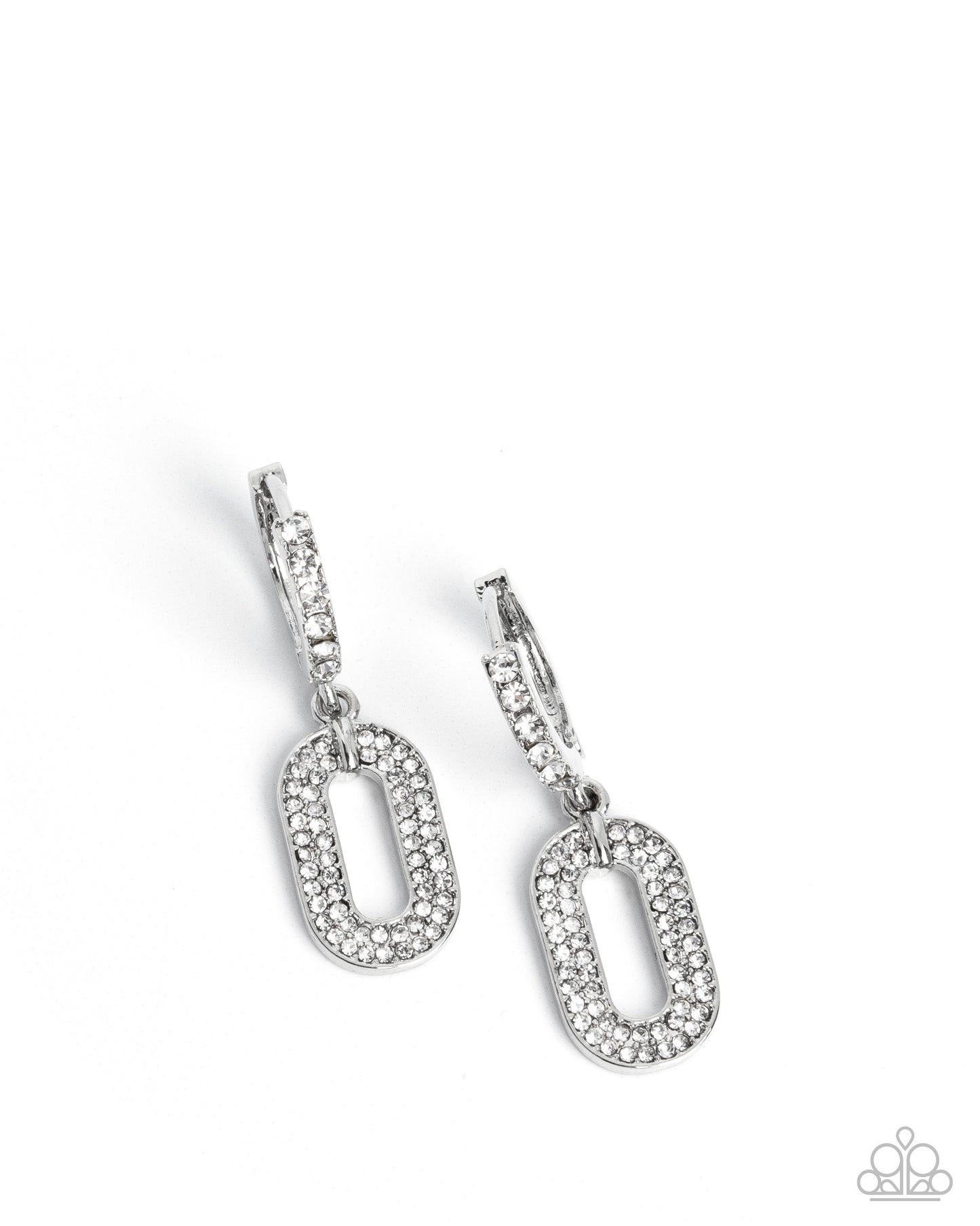 Pair of silver earrings with oval designs on a white background