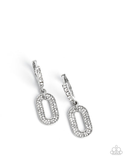 Pair of silver earrings with oval designs on a white background