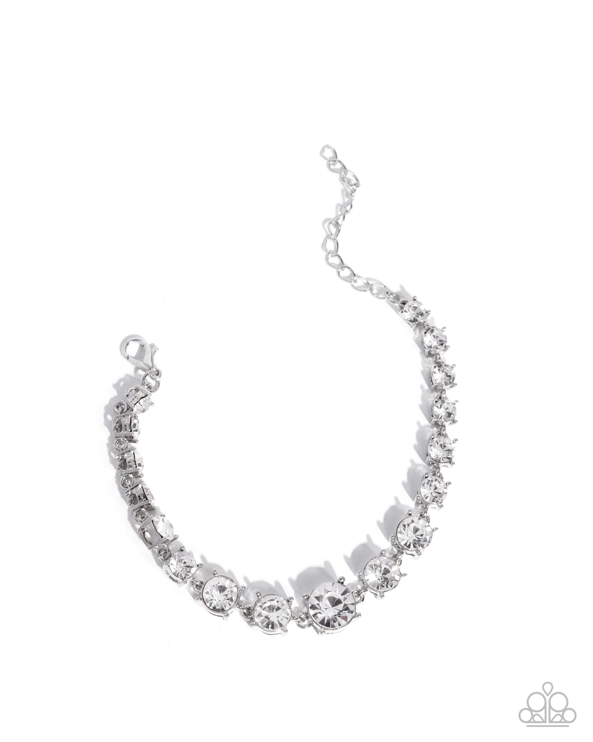 Silver bracelet with clear stones on a white background