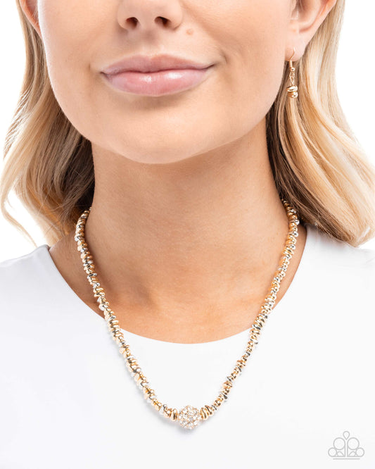 Necklace worn by a model on a white background