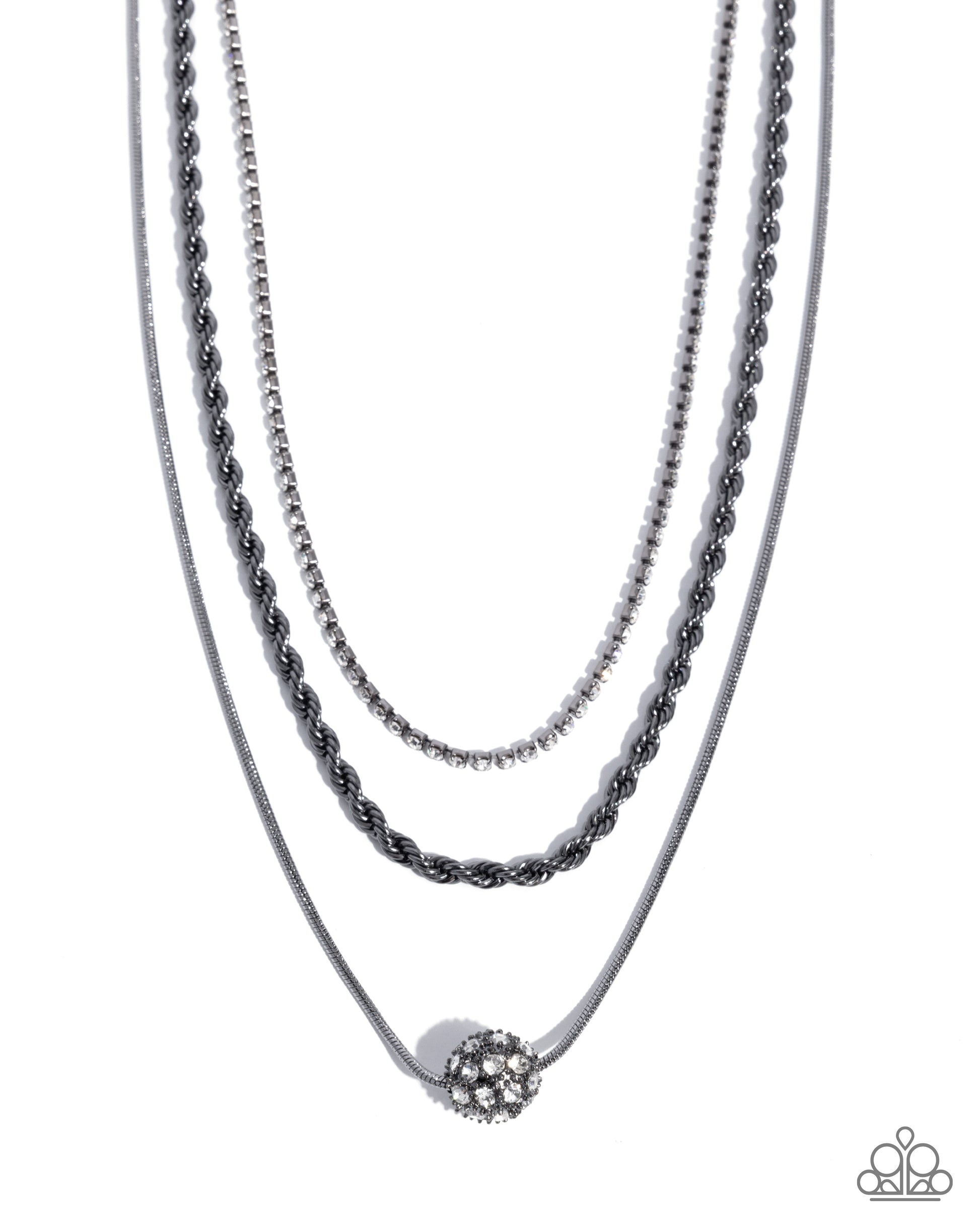 Three layered necklaces with a central pendant on a white background